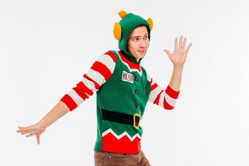 Attractive young men teenager in elf costume on white background