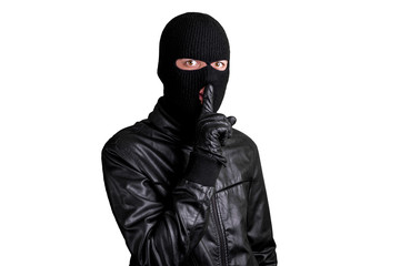 Thief in a mask showing sign quieter, isolated on a white background