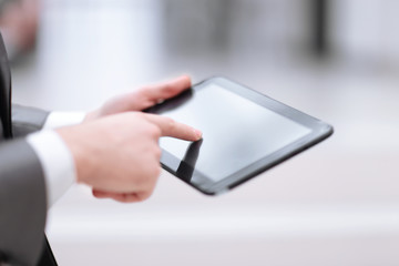 Close-up Of Businessperson Using Digital Tablet With Blank Disp