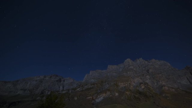 Starry night over the Daubenhorn mountain, timelapse.