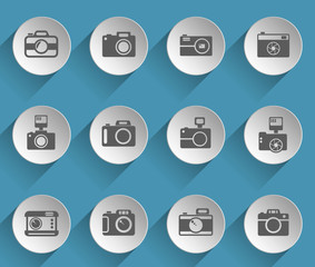 camera web icons on light paper circles