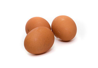 Three eggs on white background