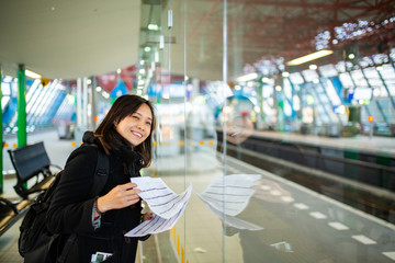 Traveler looking planning paper