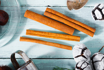 Christmas dessert chocolate truffles and spices on white wood