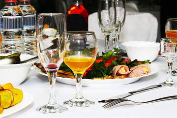 Festive table with glasses of juice