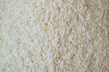 Top View of Raw White Thai Jasmine Rice for Background and Banner 