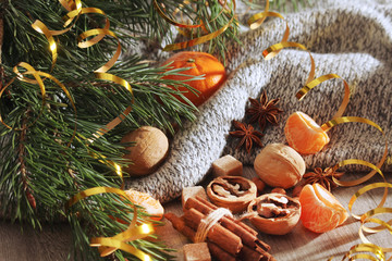 Still life formed with pine branches and New Year sweets