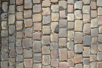 The texture of the pavement from the paving stones