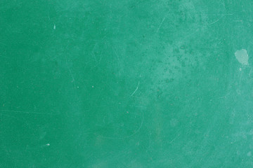 Green painted aged metal table top surface detail
