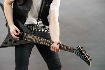 Man playing on electric guitar