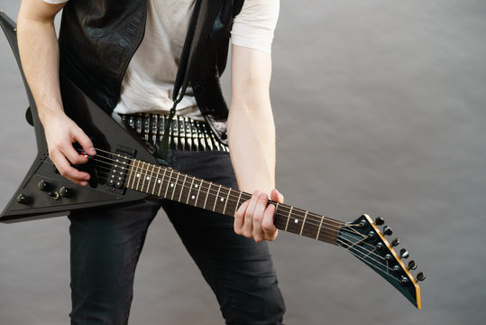 Man playing on electric guitar