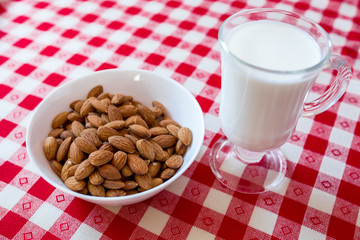 Almonds are a healthy nut. High protein content. Vegetable milk. Vegetarianism. Vegan product.