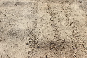 Tracks on dirt road