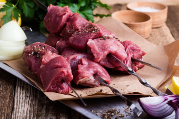 Raw fresh beef meat skewers  and cooking ingredients