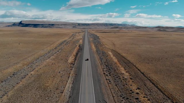 4K video from drone view of a car driving along beautiful road to El chalten, Agentina