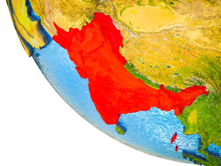 British India on model of Earth with country borders and blue oceans with waves.