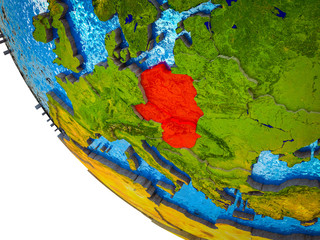Visegrad Group on model of Earth with country borders and blue oceans with waves.