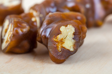 Tasty oriental sweets, churchkhela on the wooden table. Georgian national dessert