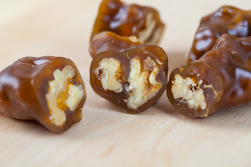 Tasty oriental sweets, churchkhela on the wooden table. Georgian national dessert
