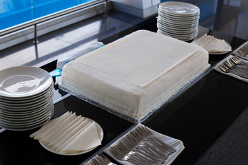 White celebration cake in honor of the anniversary, closeup