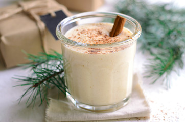 Eggnog, Traditional Christmas Drink, Cocktail with Cinnamon and Nutmeg for Winter Holidays