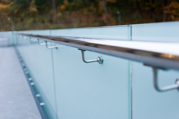 Metal railings and glass wall