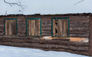 Sugar shack and old barn in a boreal forest Quebec, Canada.
