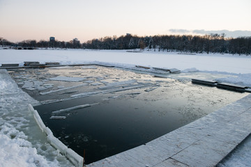 ice hole in the ice is ready for Epiphany bathing, Orthodox tradition