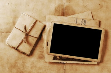 Vintage background with old blank photo frame texture