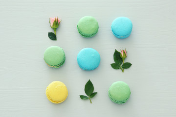 Top view of colorful macaron or macaroon over pastel background. Flat lay.