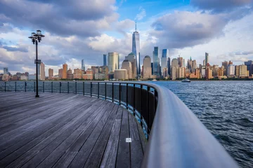 Fototapeten Blick auf die Skyline von Manhattan von der Uferpromenade von Jersey City © Damien