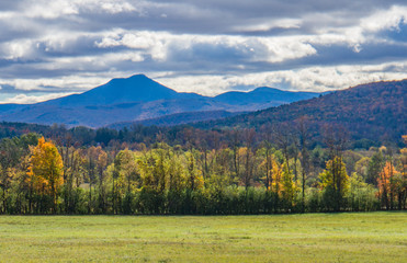 view of Camels Hump Mountain in fall foliage season, in Vermont