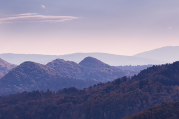 Mountain landscpae with peaks of the hills at dawn