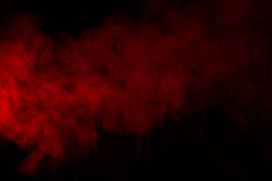 Texture of red smoke on black