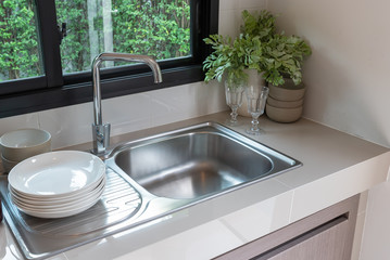 sink with faucet in kitchen room