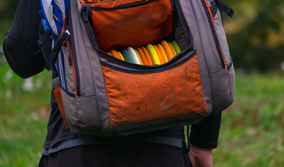 Disc golf bag on the back