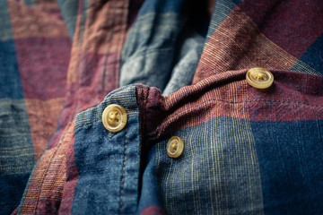 details of red and blue checkered shirt