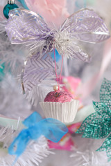 Christmas decor close-up, New Year's interior details, Christmas tree, balls on the branches, toys, candles, sock