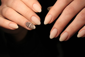 beautiful fashion manicure on a stylish textural background