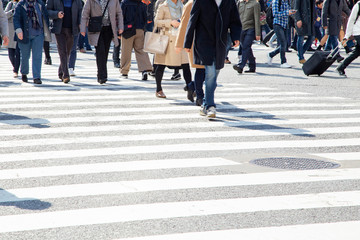 Walking on the Shibuya intersection with diagonal crosswalks