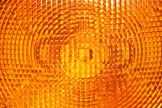 Abstract background of yellow faceted plastic