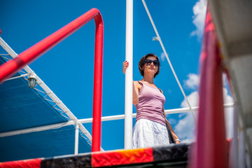 Woman traveling on a ferry boat