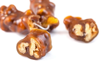 Tasty oriental sweets, churchkhela on  white background. Georgian national dessert
