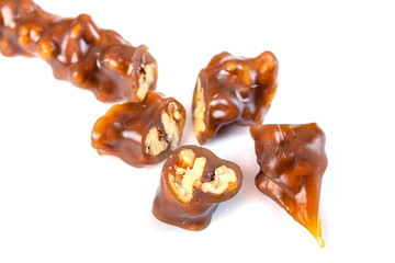 Tasty oriental sweets, churchkhela on  white background. Georgian national dessert