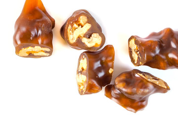 Tasty oriental sweets, churchkhela on  white background. Georgian national dessert