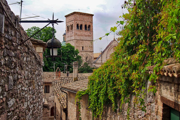 View to the tower of church of San Rufino in Assisi