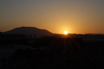 Sunset over the sand dunes in the Natural Park in Fuerteventura,Canary-Islands,Spain.