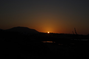 Sunset over the sand dunes in the Natural Park in Fuerteventura,Canary-Islands,Spain.
