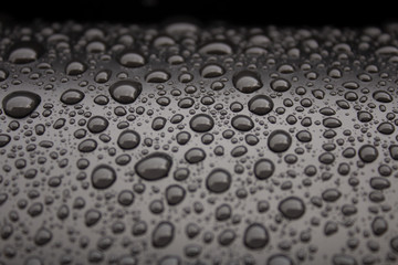Drops of water on the surface of plastic pipe..