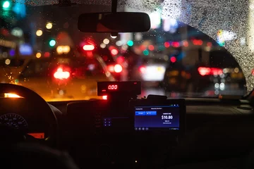 Aluminium Prints New York TAXI Interior view of taxi cab stuck in New York traffic